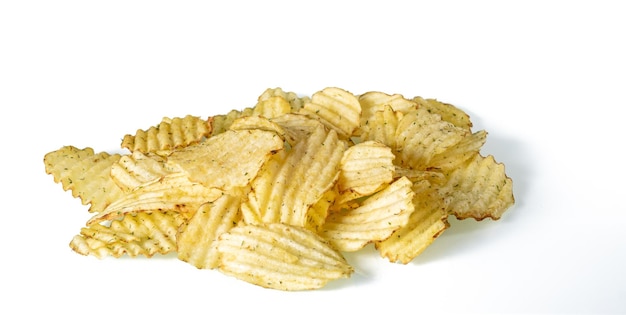 A bunch of potato chips with dill on a white background