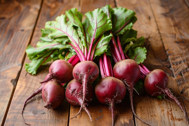 Bunch of ripe beets on a wooden table