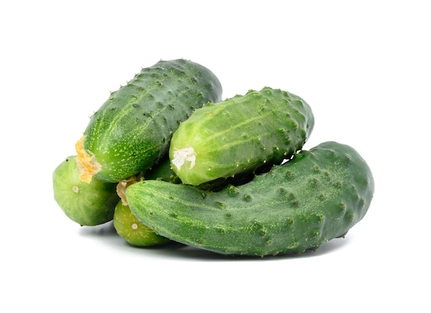 Bunch of ripe green cucumbers on a white isolated background