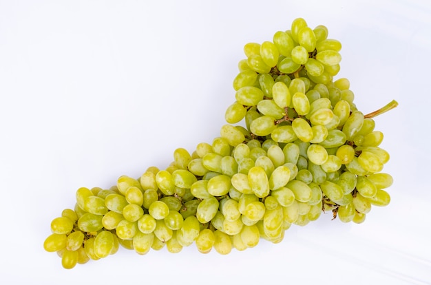 Bunch of ripe green grapes on white background. Studio Photo.