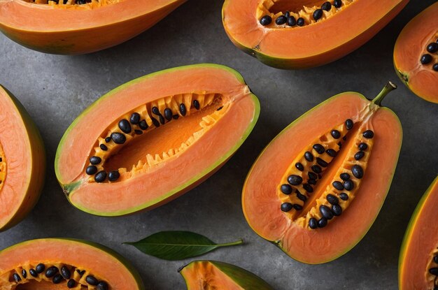 a bunch of sliced melon with black seeds on top of it