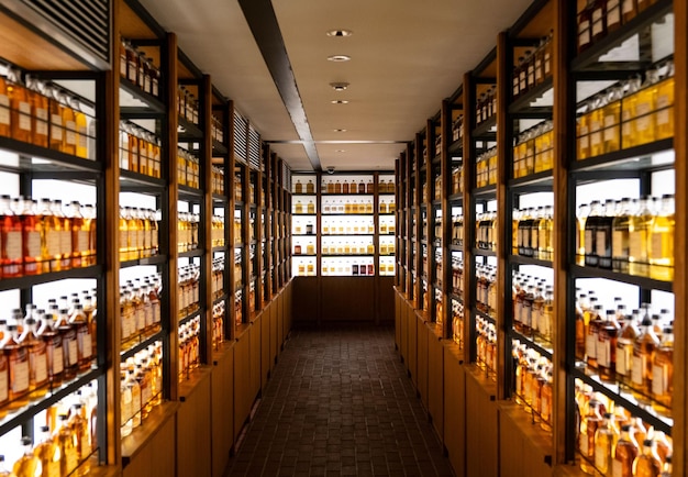 Bunch of various whiskeys on the shelves in the Whisky Library in Japan