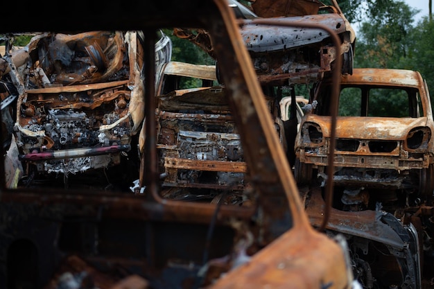 A bunch of wrecked and burned civilian cars in the city of Gostomel Kyiv region