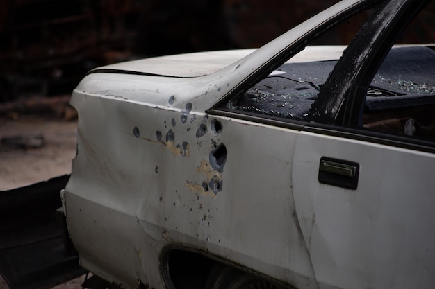 A bunch of wrecked and burned civilian cars in the city of Gostomel Kyiv region