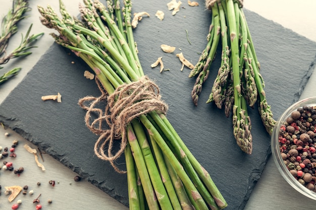 Bunches of asparagus with spices 