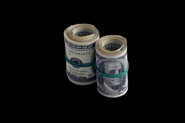 Bundle of US dollar bills isolated on black Pack of american money with high resolution on perfect black background