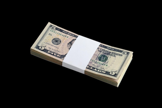 Bundle of US dollar bills isolated on black Pack of american money with high resolution on perfect black background