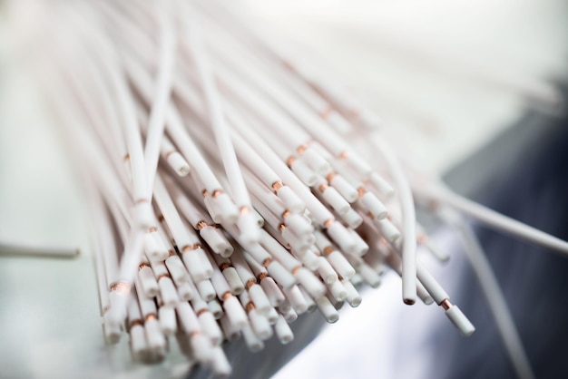 A bundle of white stripped electrical copper wires