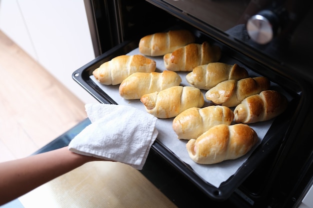 Buns are baked in the oven check readiness