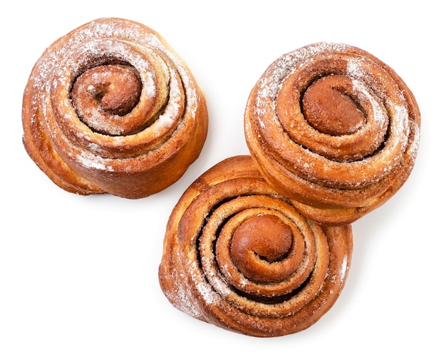 Buns with cinnamon on white background isolated The view from top