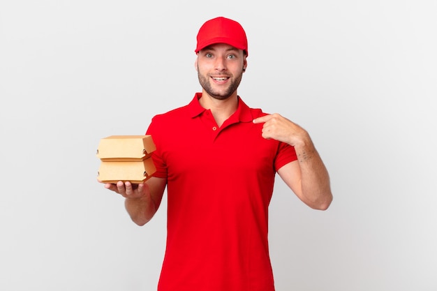 Burger deliver man feeling happy and pointing to self with an excited