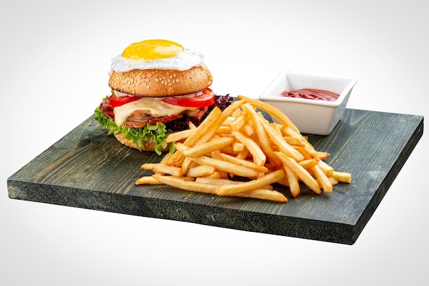 Burger for kids with fries and sauce On a white background