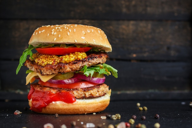 burger, meat cutlet beef steak, tomato, sauce and lettuce