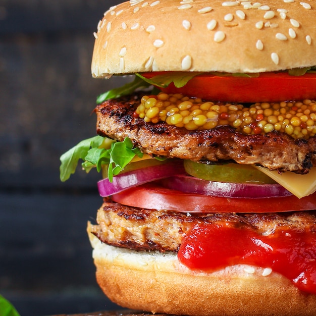 burger, meat cutlet beef steak, tomato, sauce and lettuce