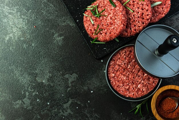 Burger Press with Beef Meat Portions for BBQ Grill Top View Background