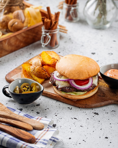 Burger set with jalapeno and potato wedges