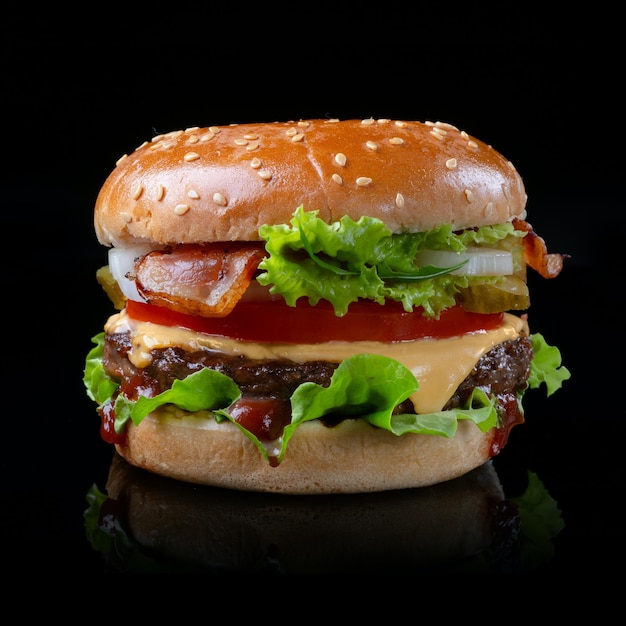 Burger with pattie and latus tomato cheese slice