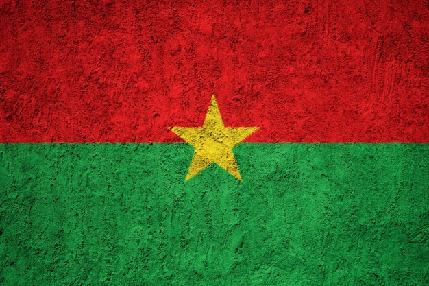 Burkina Faso flag painted on grunge wall