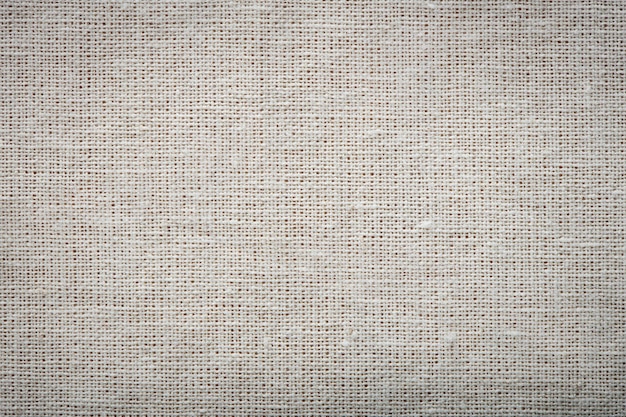 Burlap linen weave fabric background Sackcloth material Natural woven rustic bagging material Light textile texture Sacking linen fabric pattern Closeup top view