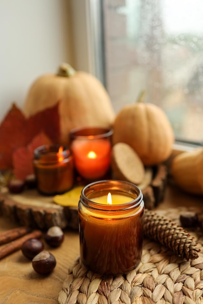 Burning candle and autumn decor home decor aesthetics