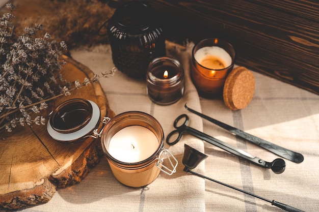 Burning candles and accessories for them atmospheric photo