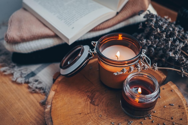 Burning candles book and lavender aesthetic autumn photo