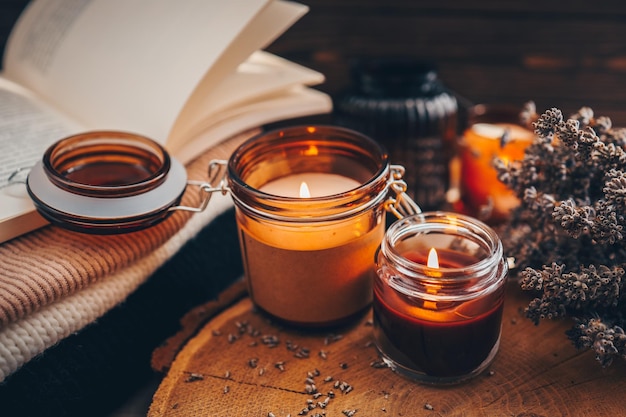 Burning candles book and lavender aesthetic autumn photo