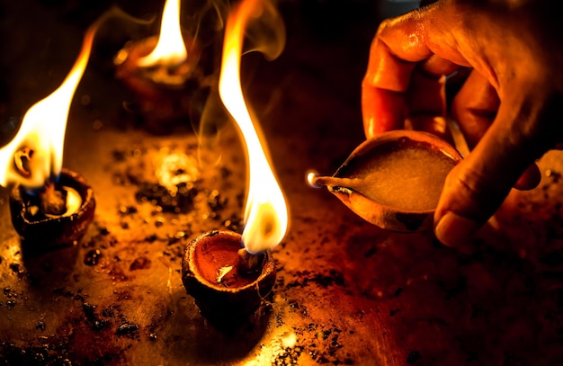 Burning candles in the Indian temple. Diwali – the festival of lights.