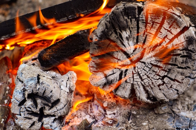 Burning charcoal on a barbecue, embers in the fire, embers, fire, campfire, embers background