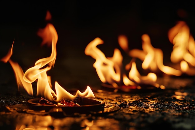 Burning diya on black background Shallow depth of field