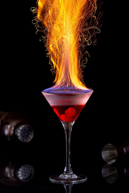 Burning shot shot and fire on a dark background