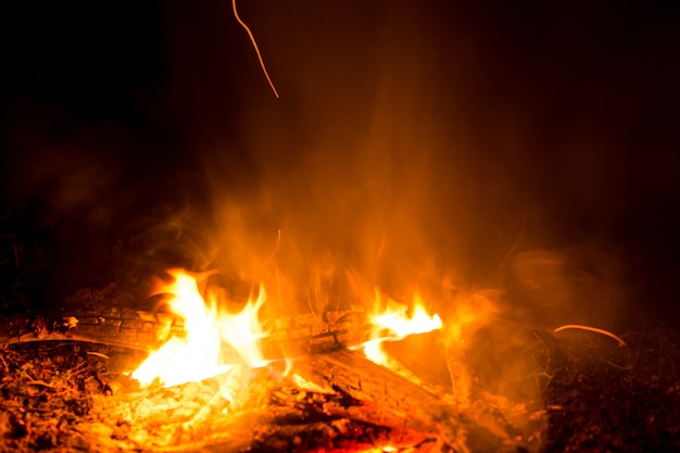 Burning wood in the night