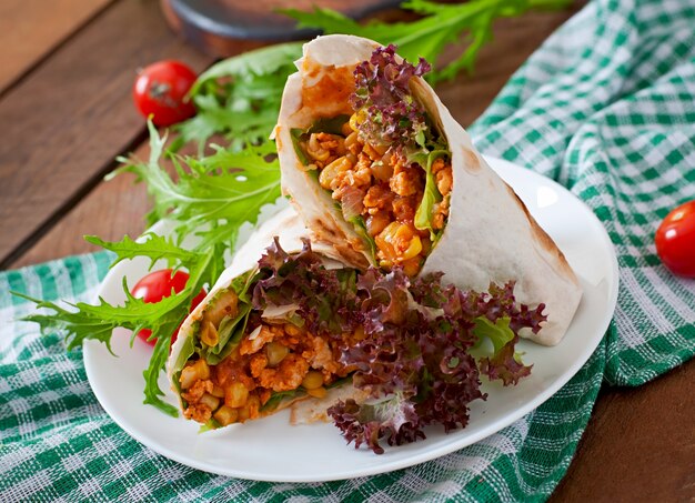 Burritos wraps with minced beef and vegetables