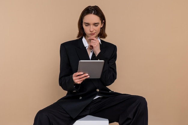 Busines woman Young cute business woman with tablet in hands