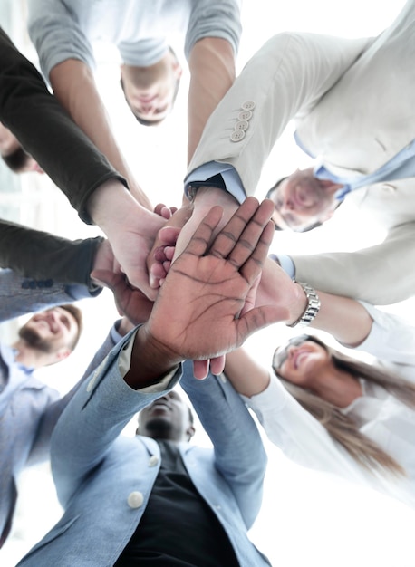 Business backgroundbusiness team making a stack of hands