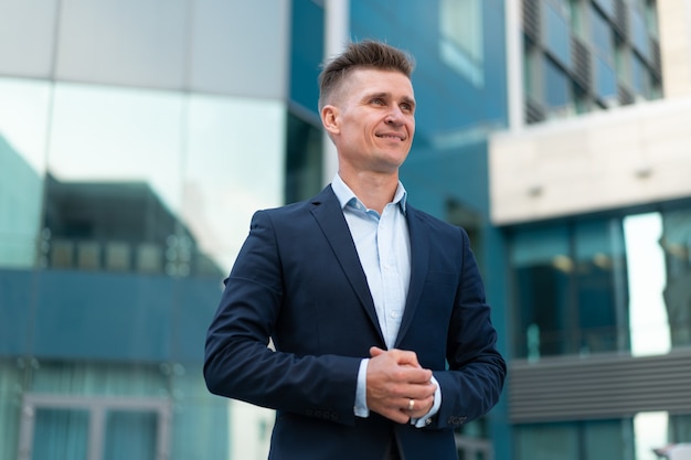 Business. Businessman Standing City Street Office Building Handsome Caucasian Male Business Person Portrait Corporative Building Background Successful Young Adult Manager