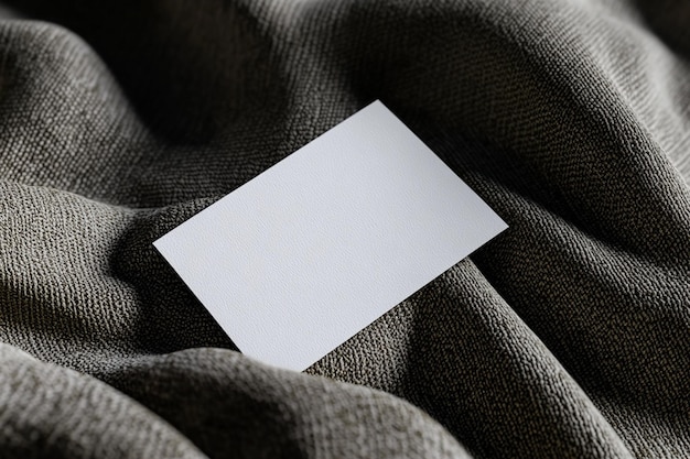 Business card mockup on fabric texture