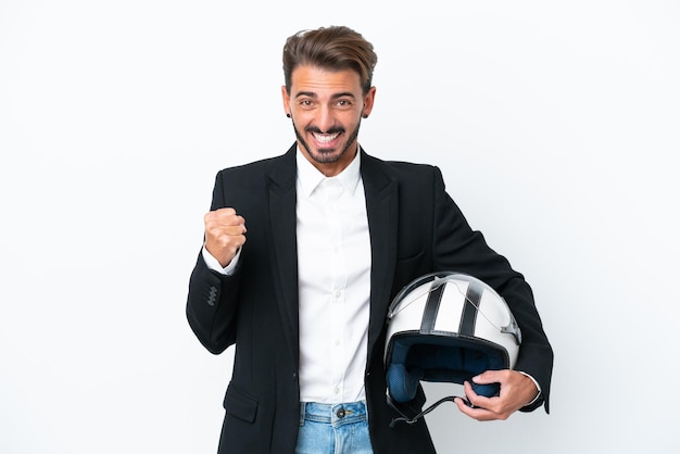 Business caucasian man isolated on white background celebrating a victory in winner position