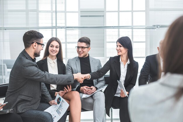 Business colleagues greet each other in the conference room. concept of cooperation