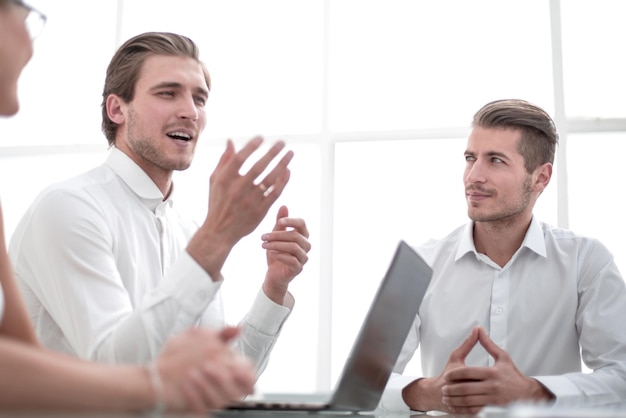 Business colleagues sitting at the Desk