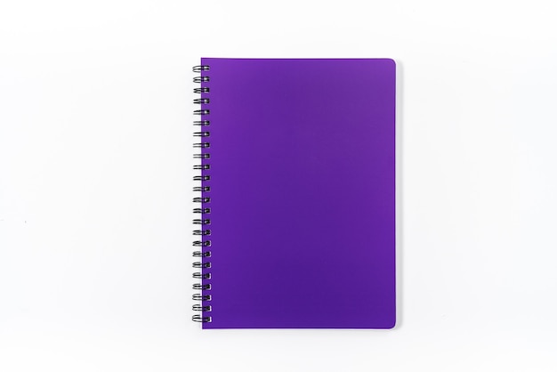 Business concept - Top view collection of spiral kraft notebook front, purple And white open page isolated on background for mockup