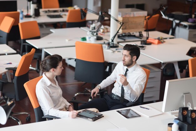 business couple working together on project at modern startup office