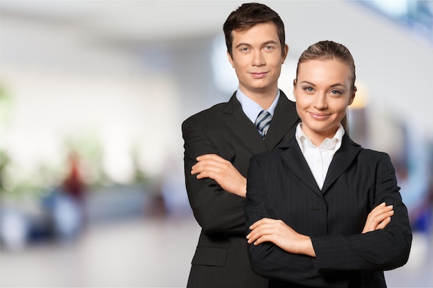 Business couple, young man and woman wearing formal suits