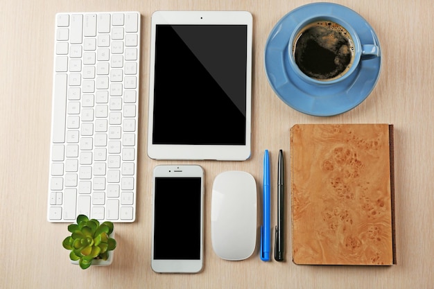 Business desk with equipment flat lay