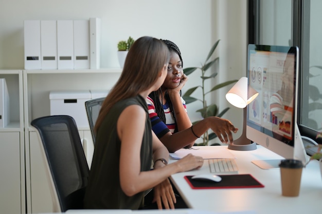 Business discussions Shot of businesswomen brainstorming in an office