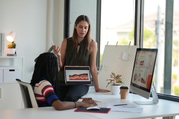 Business discussions Shot of businesswomen brainstorming in an office