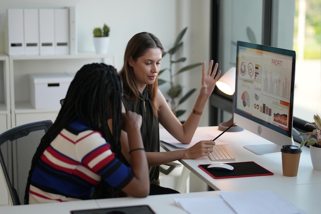 Business discussions Shot of businesswomen brainstorming in an office