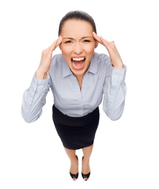 business and emotion concept - frightened businesswoman screaming