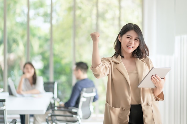 Business employee enjoy and happy to work at company office with positive attitude.