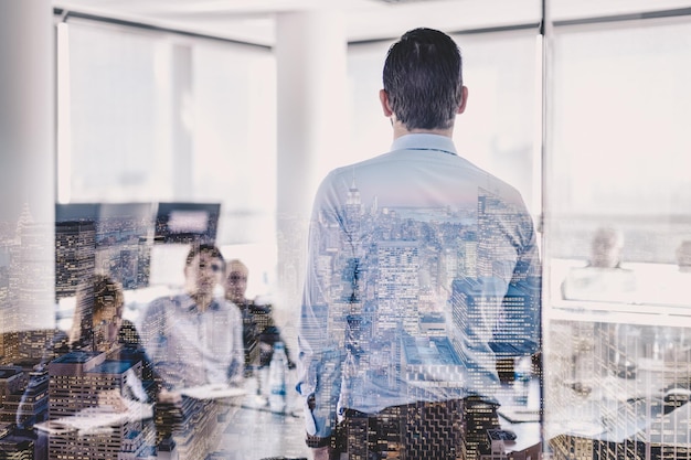 Business executive giving instructions on corporate business meeting in modern office